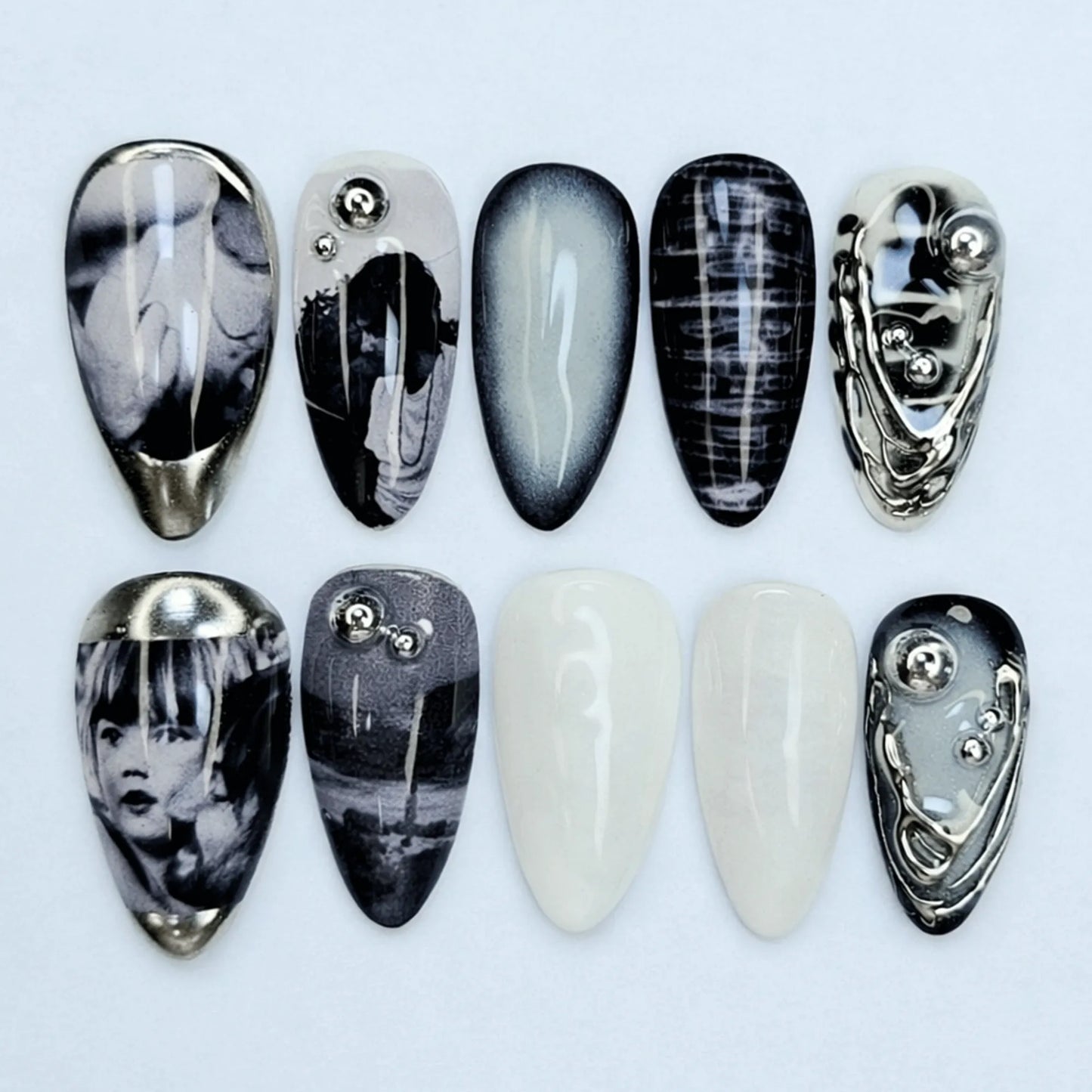 Noir Surrealism Chrome Nails